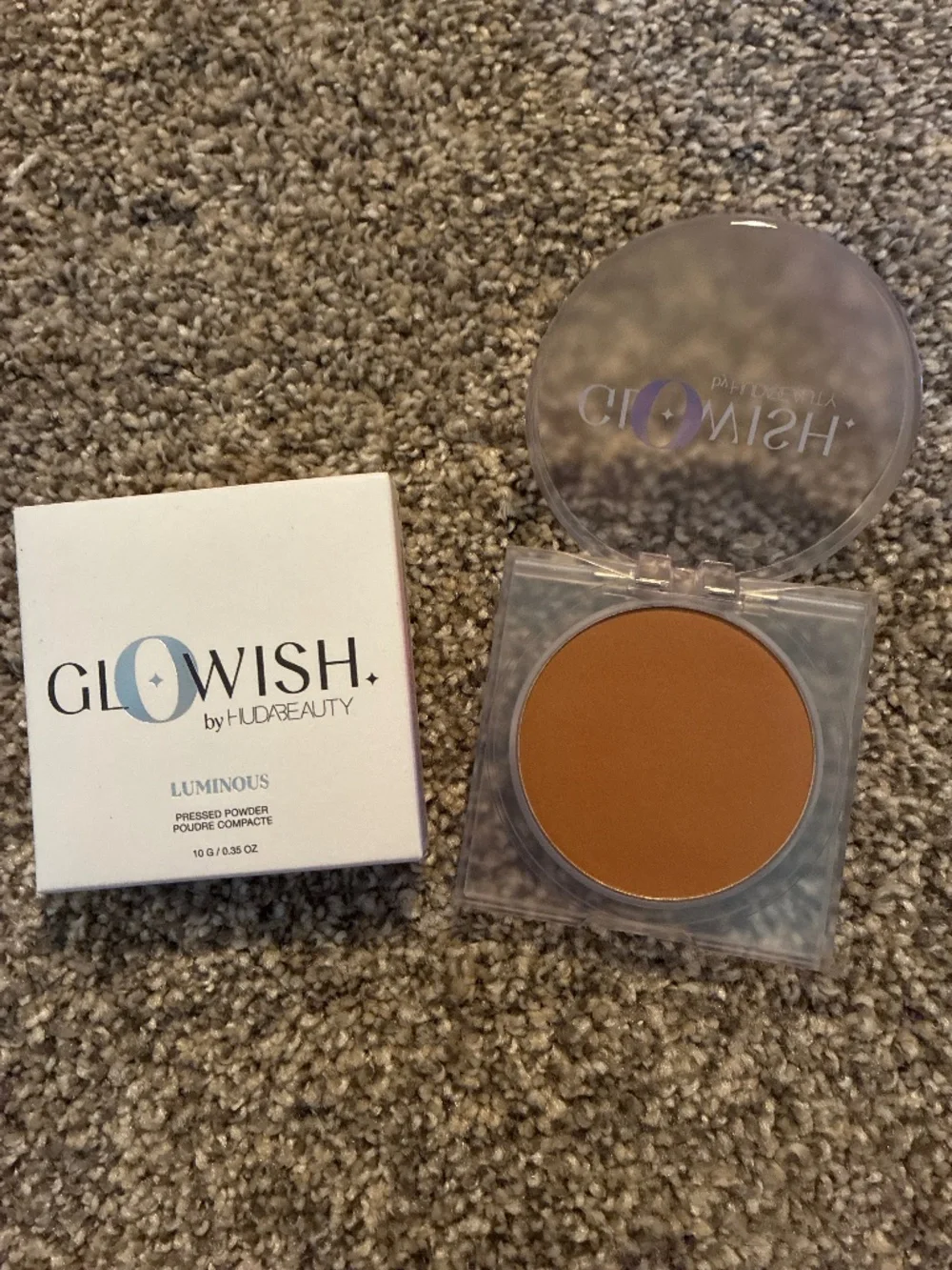 Huda Beauty Glowish Luminous Pressed Powder Extra Tan 09